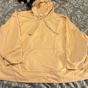 Peach colored hoodie